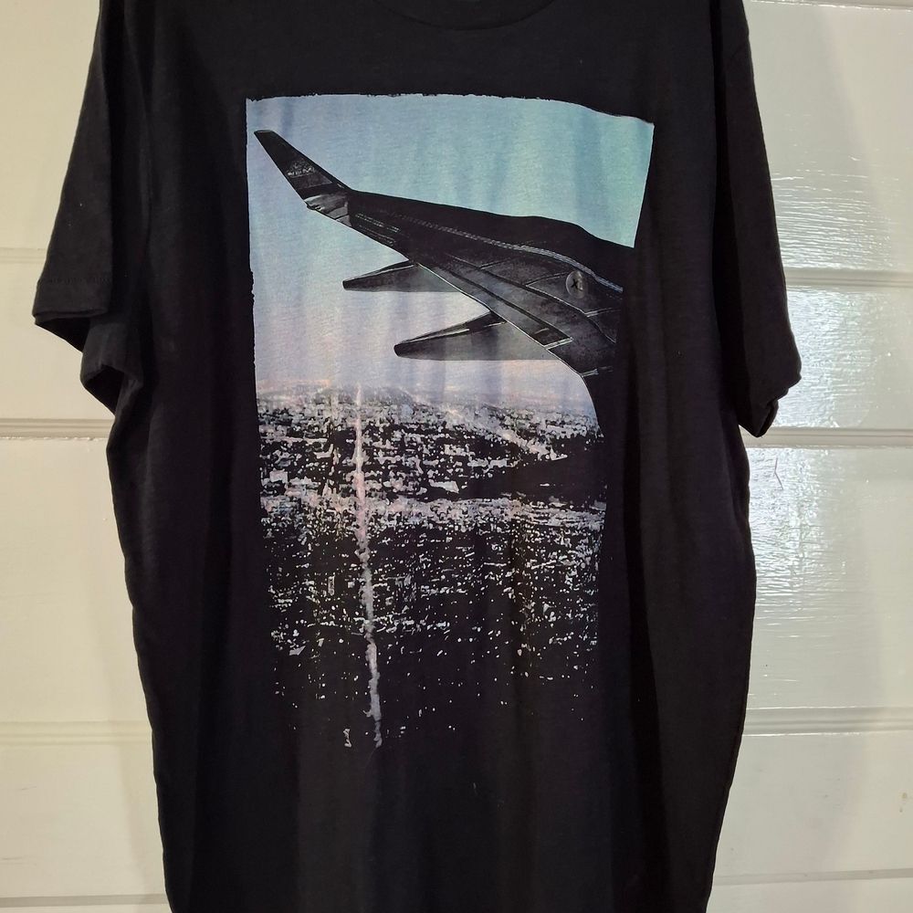 Free State Black Graphic Tee with Airplane Design